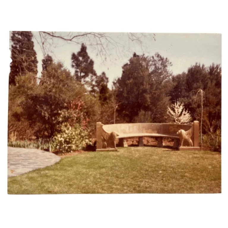 Old-world half-mon garden bench